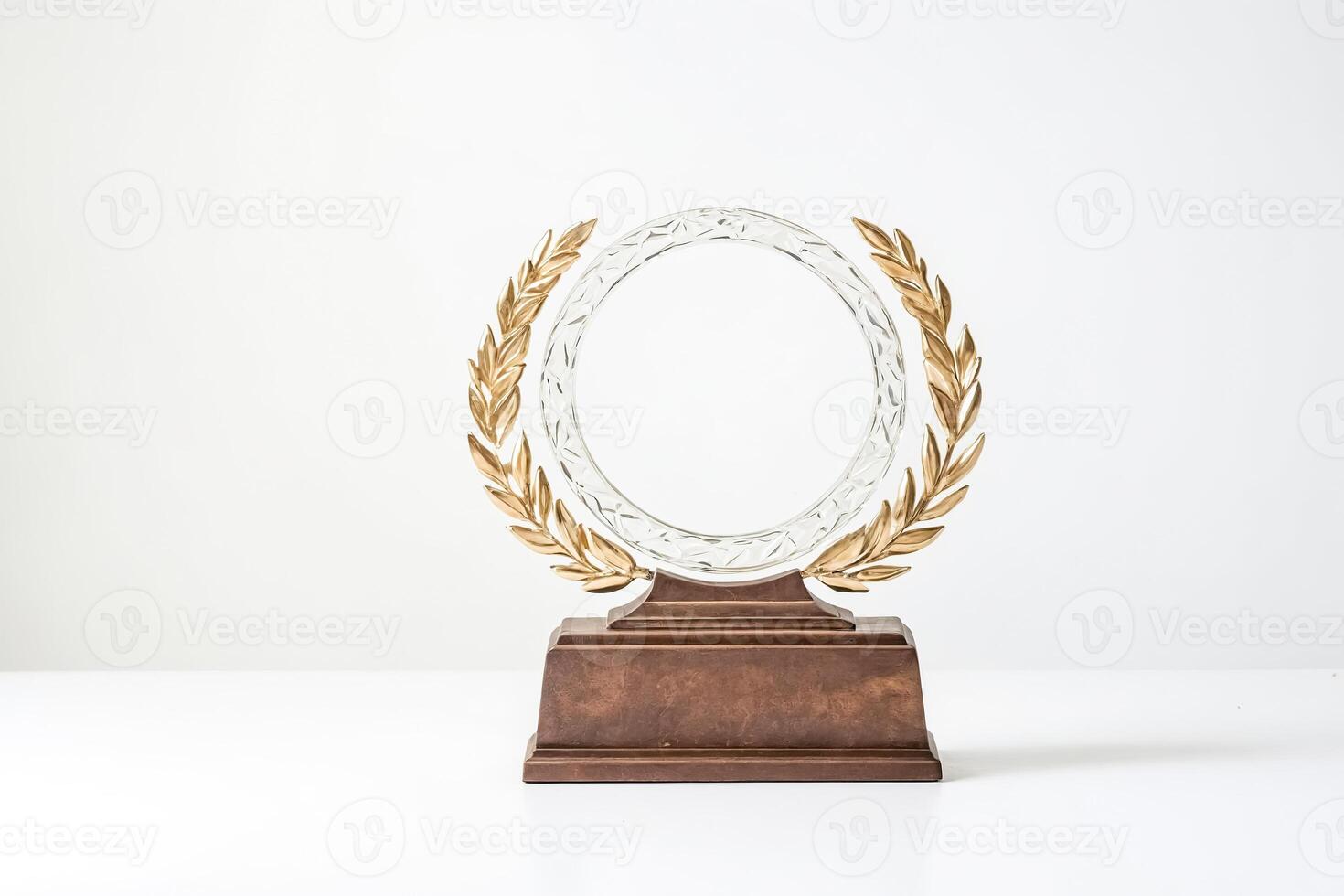 Gold Trophy with Laurel Wreath on White Background photo