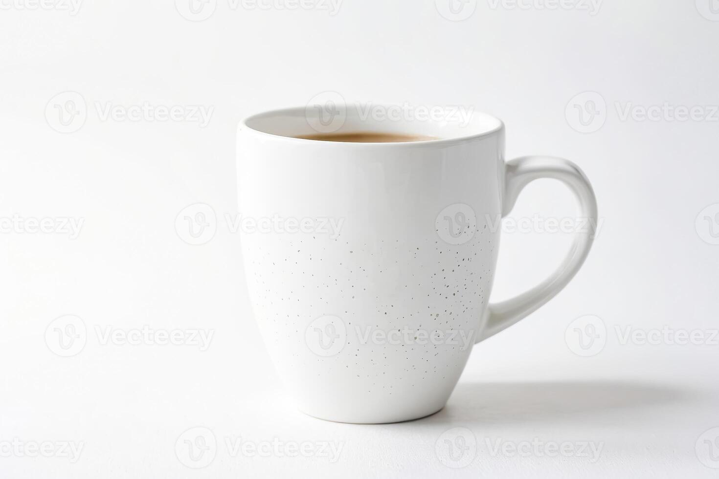 White Mug With Coffee on White Background photo
