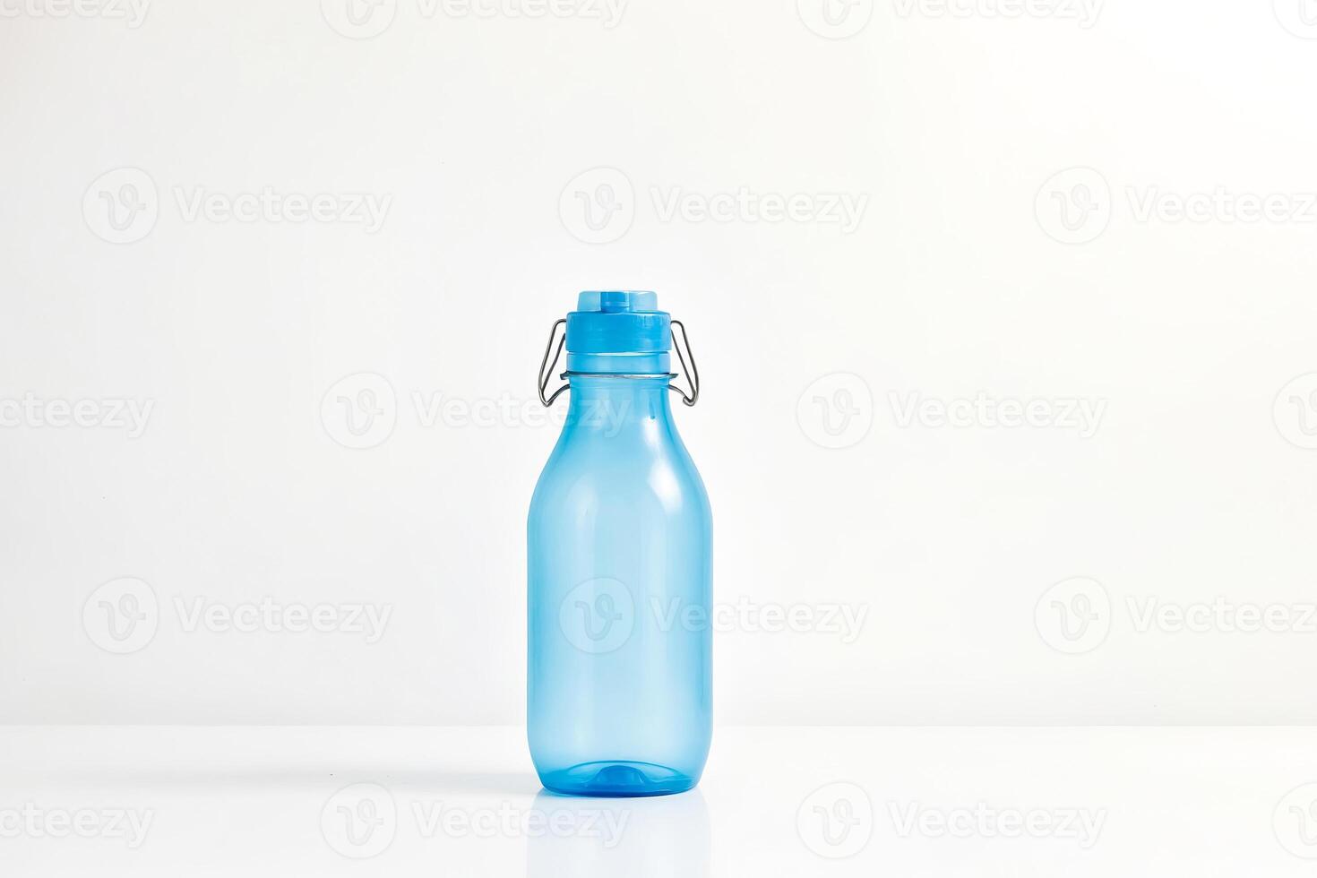 Blue Water Bottle with Metal Carry Loop on White Background photo