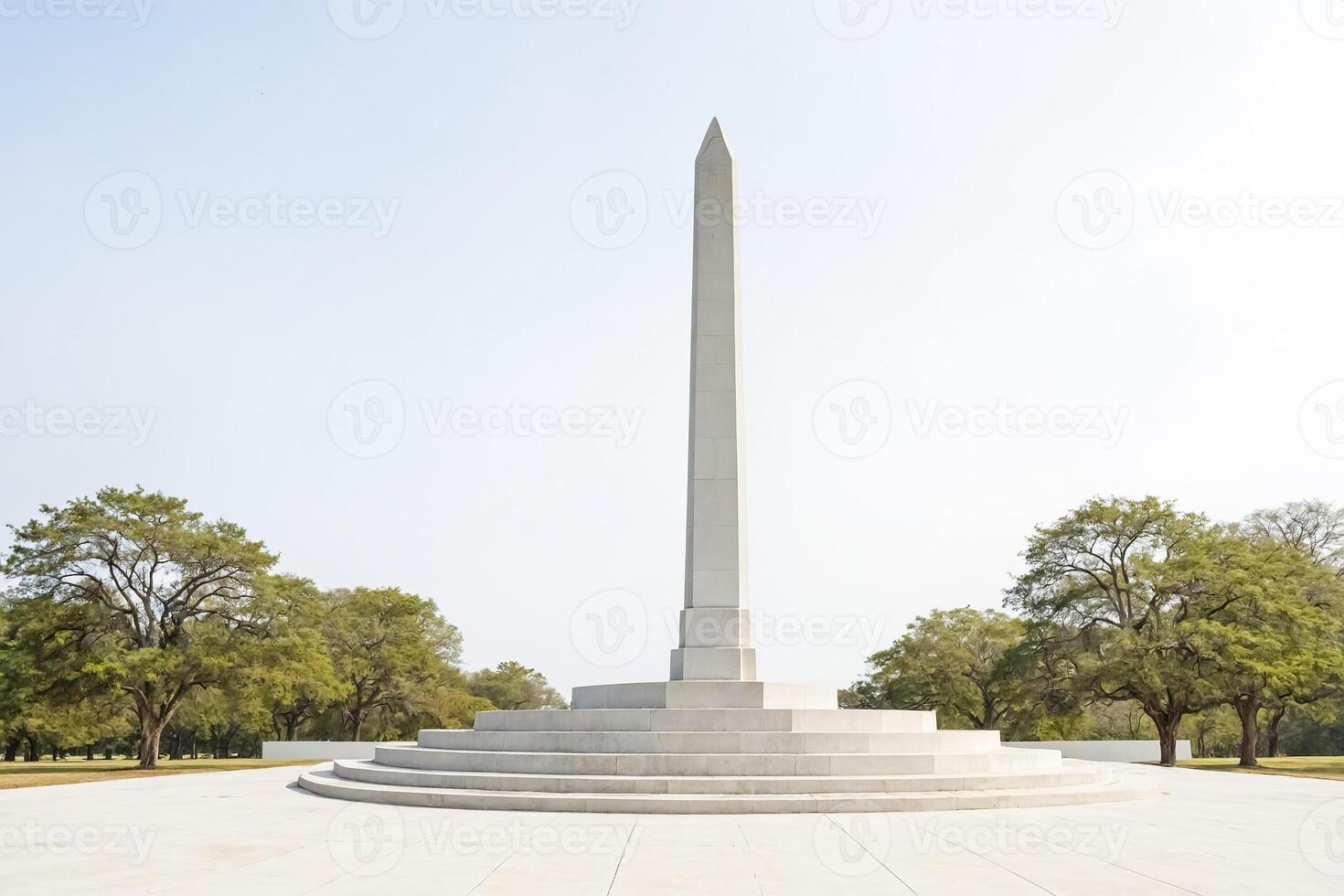 Monument in a grassy field photo