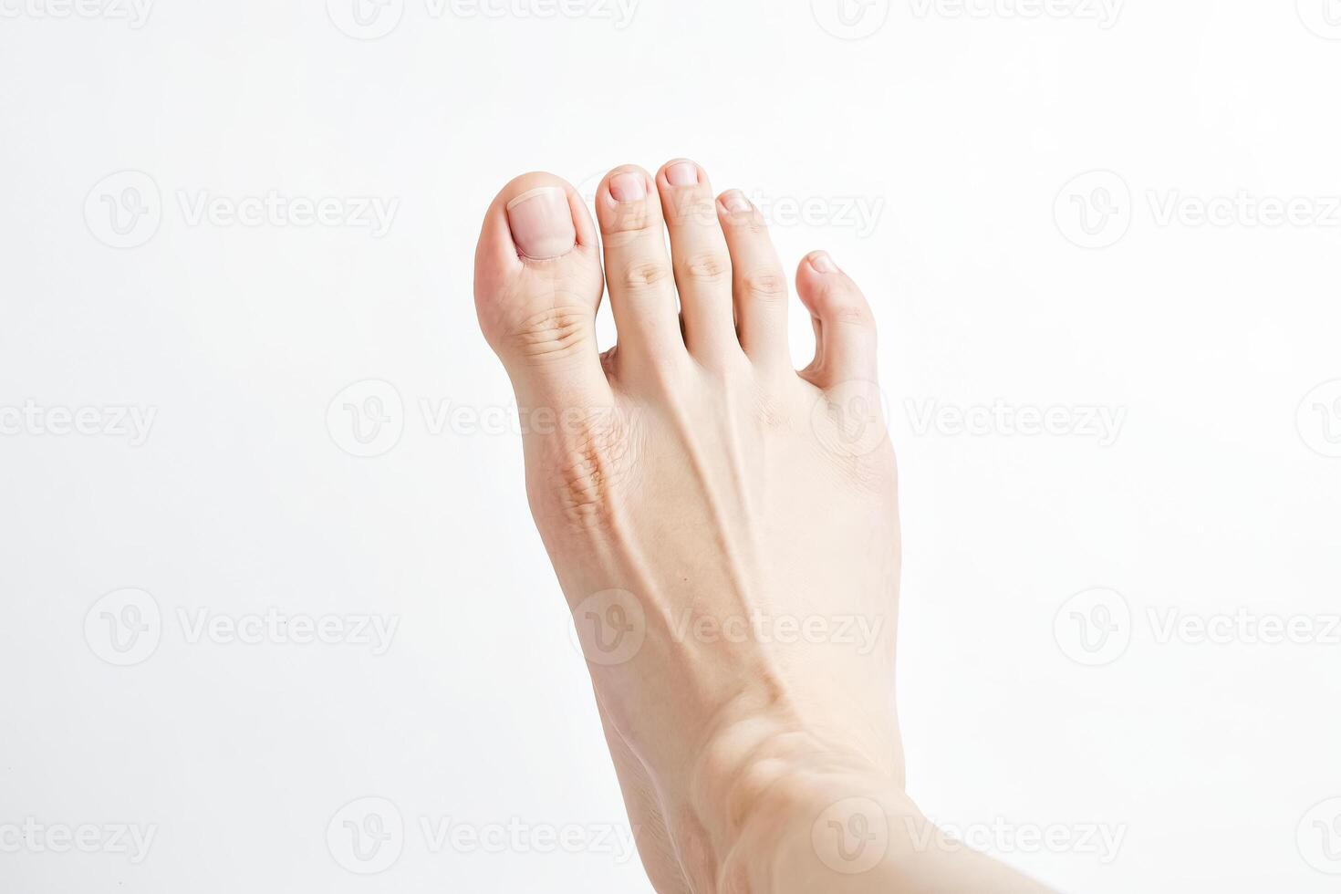 Closeup of a human foot on a white background photo