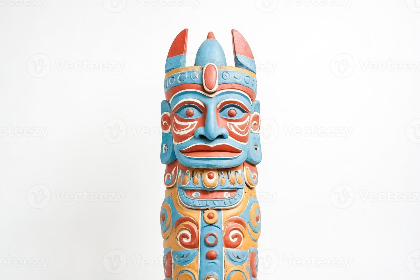 Colorful Totem Pole with Intricate Carvings photo