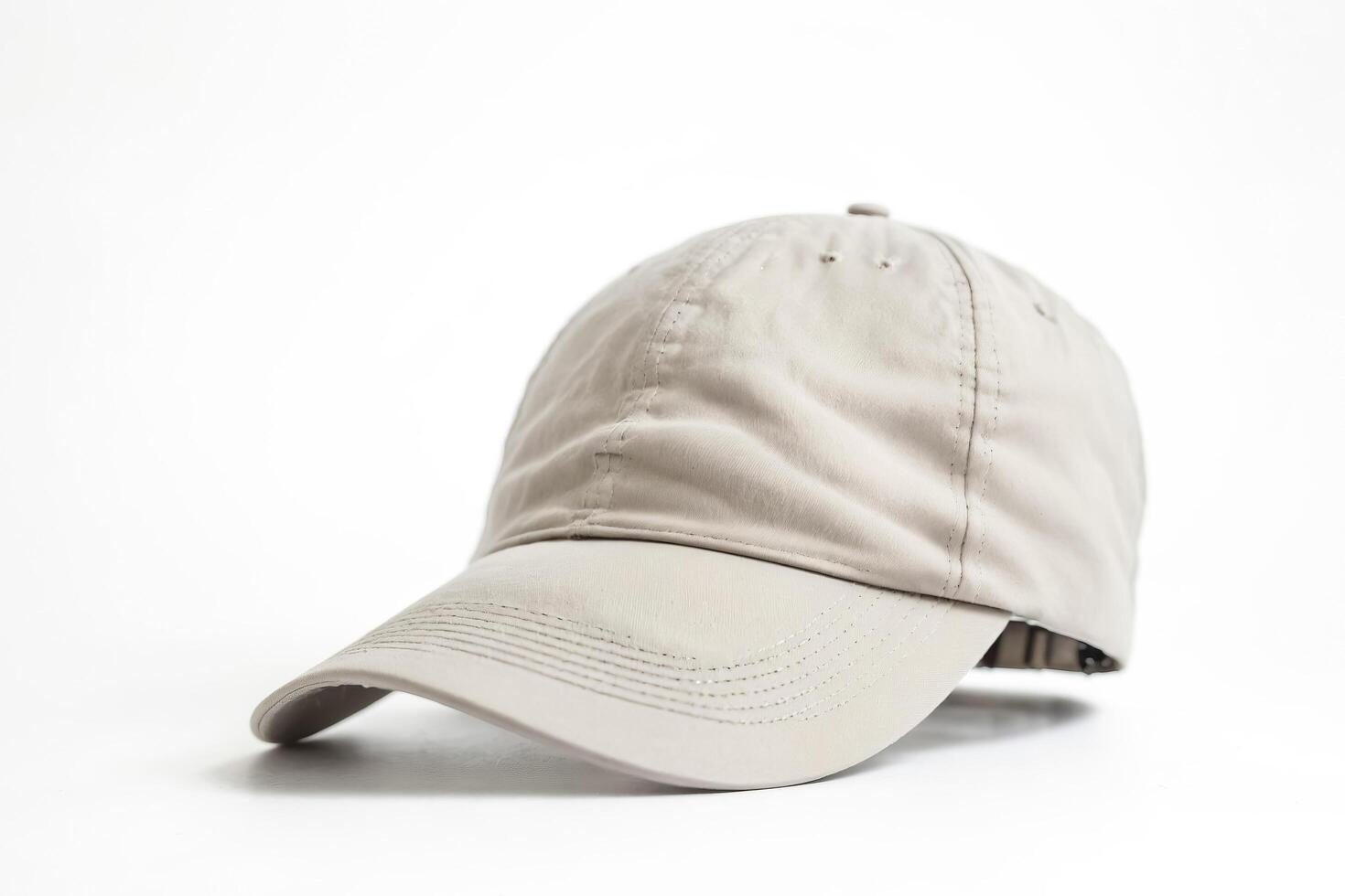 Blank Beige Baseball Cap Isolated on White Background photo
