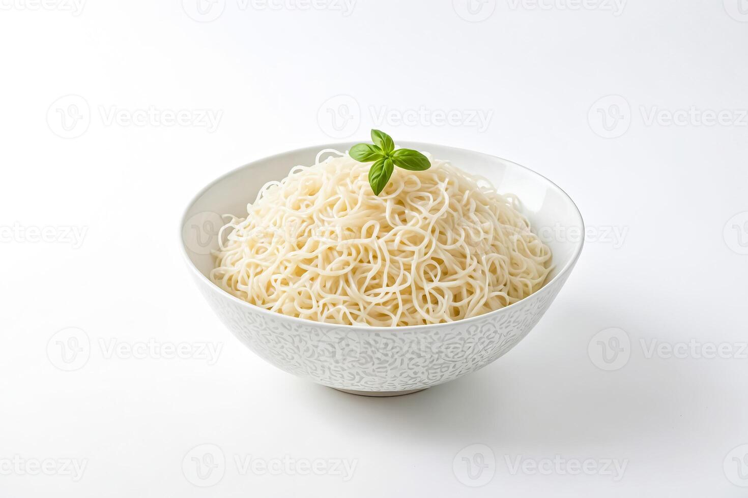 Bowl of Noodles with Basil Garnish photo