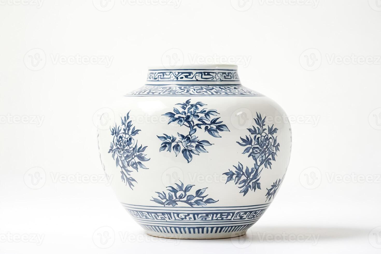 Blue and White Porcelain Vase with Floral Design photo