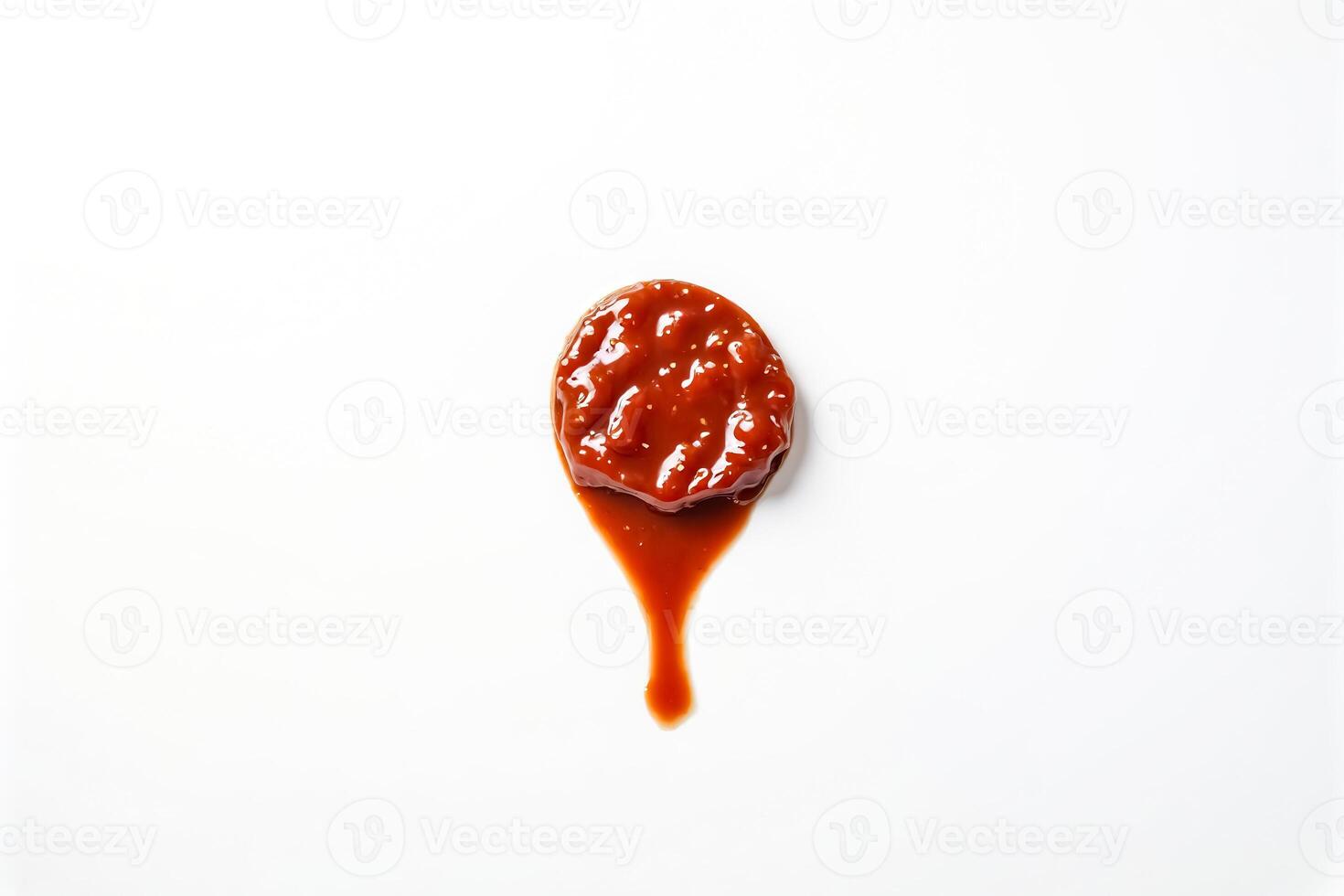 Droplet of Red Sauce on White Background photo