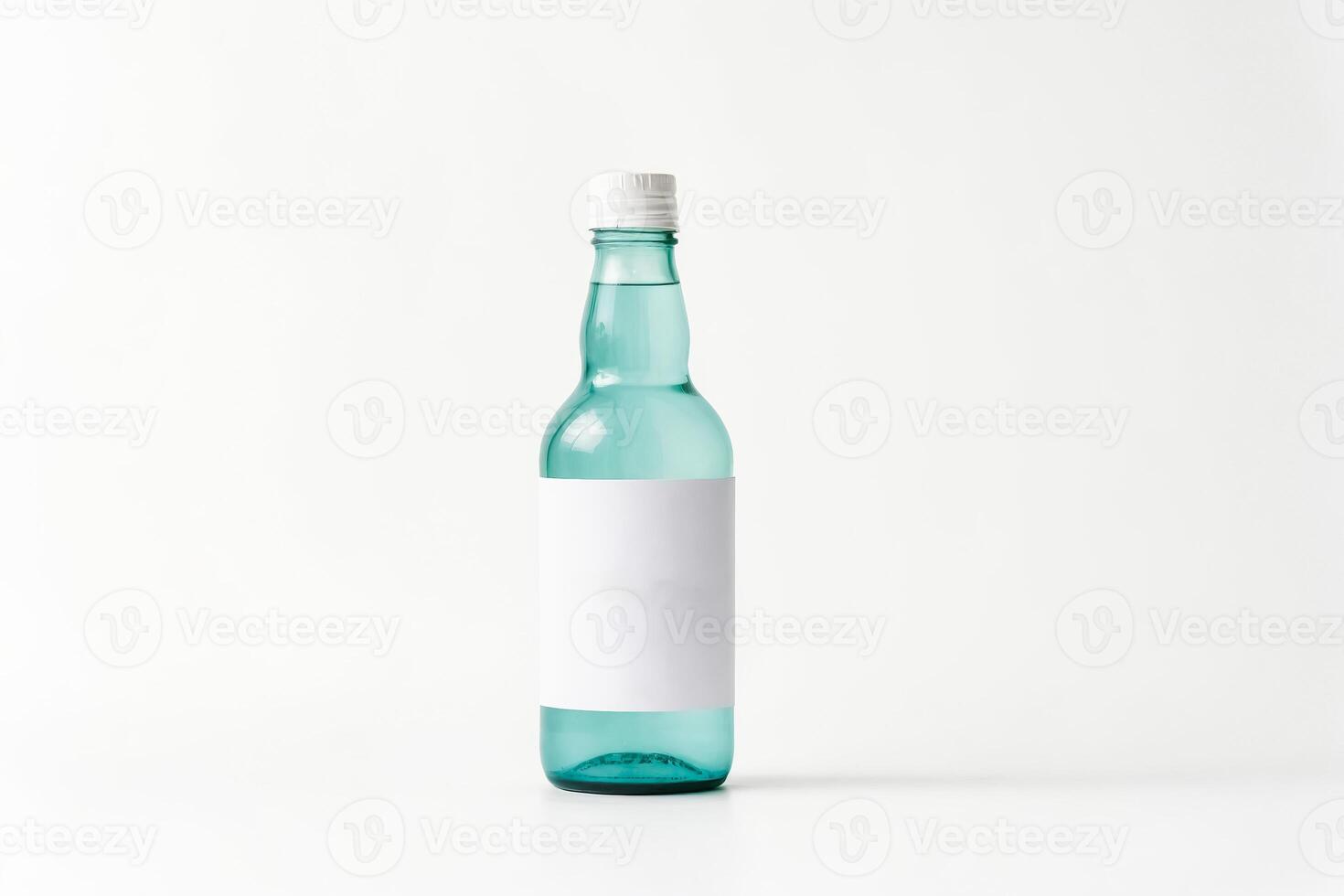 Glass Bottle With Blank Label On White Background photo