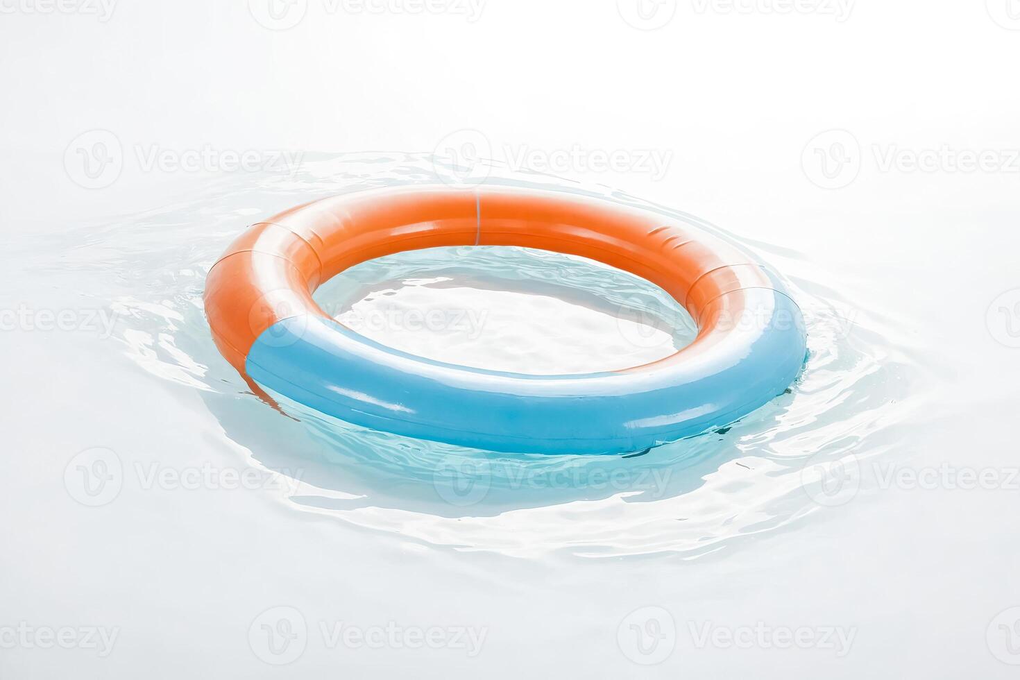 Orange and Blue Inflatable Ring Floating in Water photo