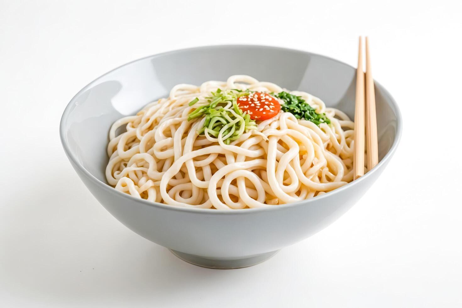 Bowl of Udon Noodles with Sesame Seeds, Green Onion and Chili Sauce photo