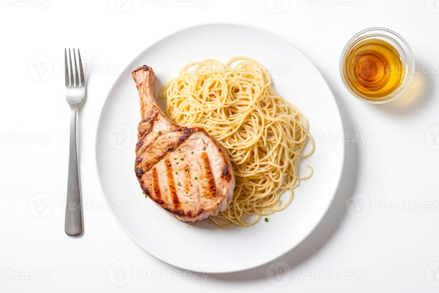 Grilled Pork Chop with Spaghetti on White Plate photo
