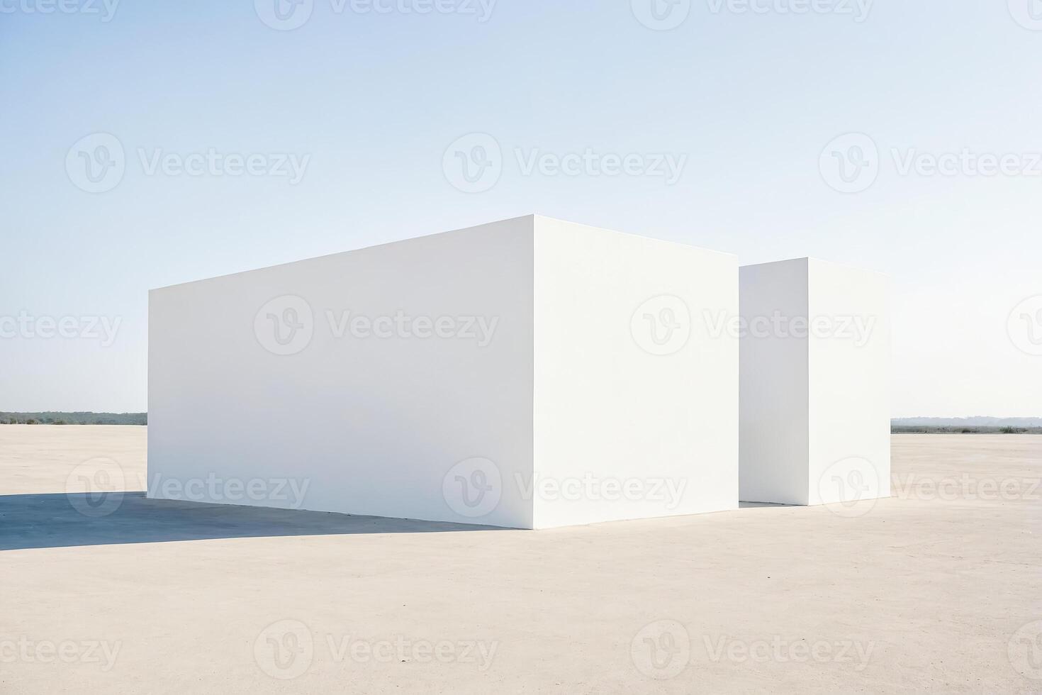Minimalist White Cube Structure in a Desolate Landscape photo