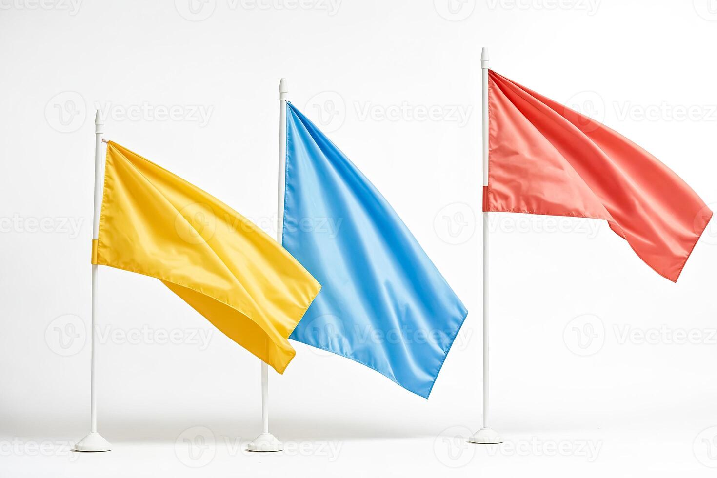 Three flags waving in the wind against a white background photo
