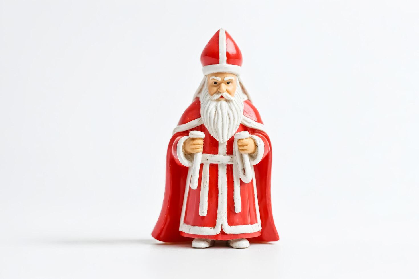 Saint Nicholas Figurine on White Background photo