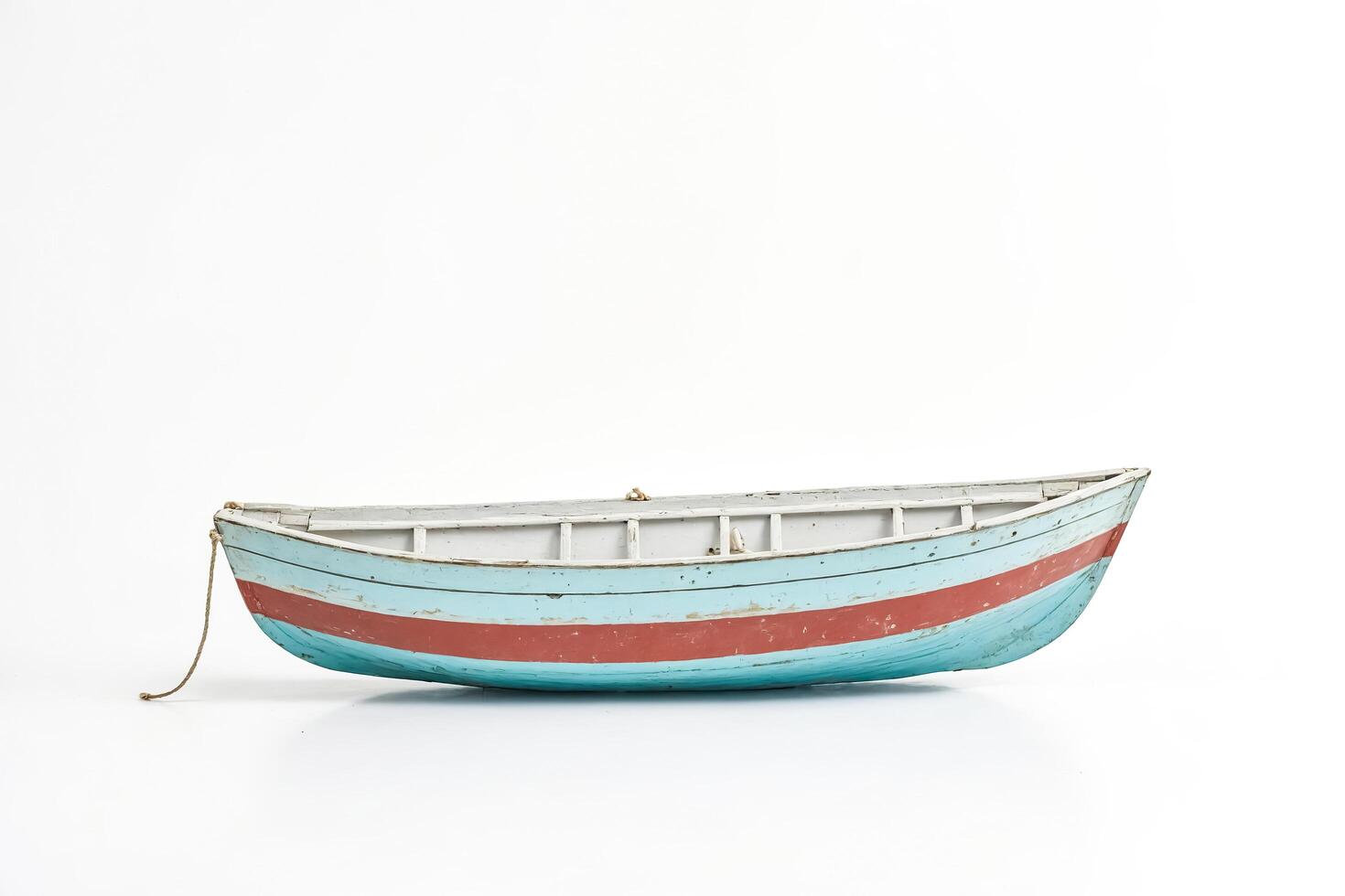 Wooden Rowboat Isolated on White Background photo