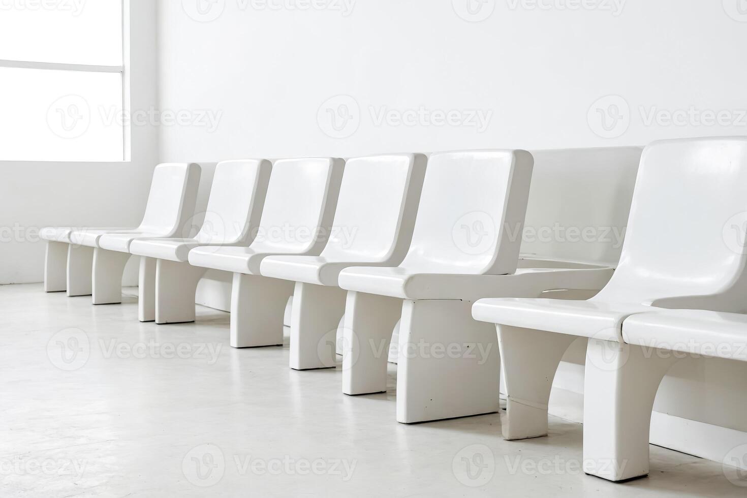 Row of White Chairs in Minimalist Interior photo
