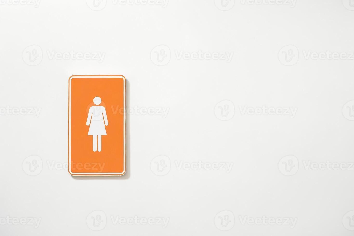 Orange Women's Restroom Sign on White Wall photo