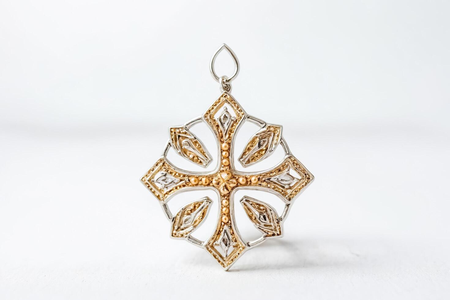 Ornate Gold and Silver Cross Pendant photo