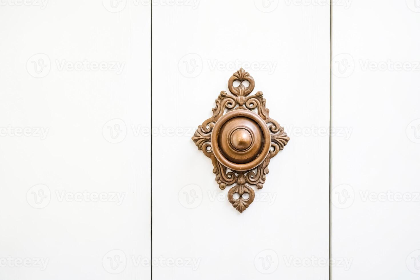 Vintage Door Knob on White Panel photo