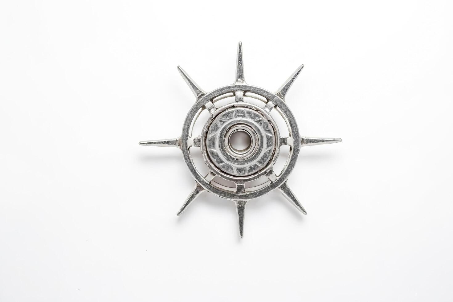Silver Metal Star With Spikes photo