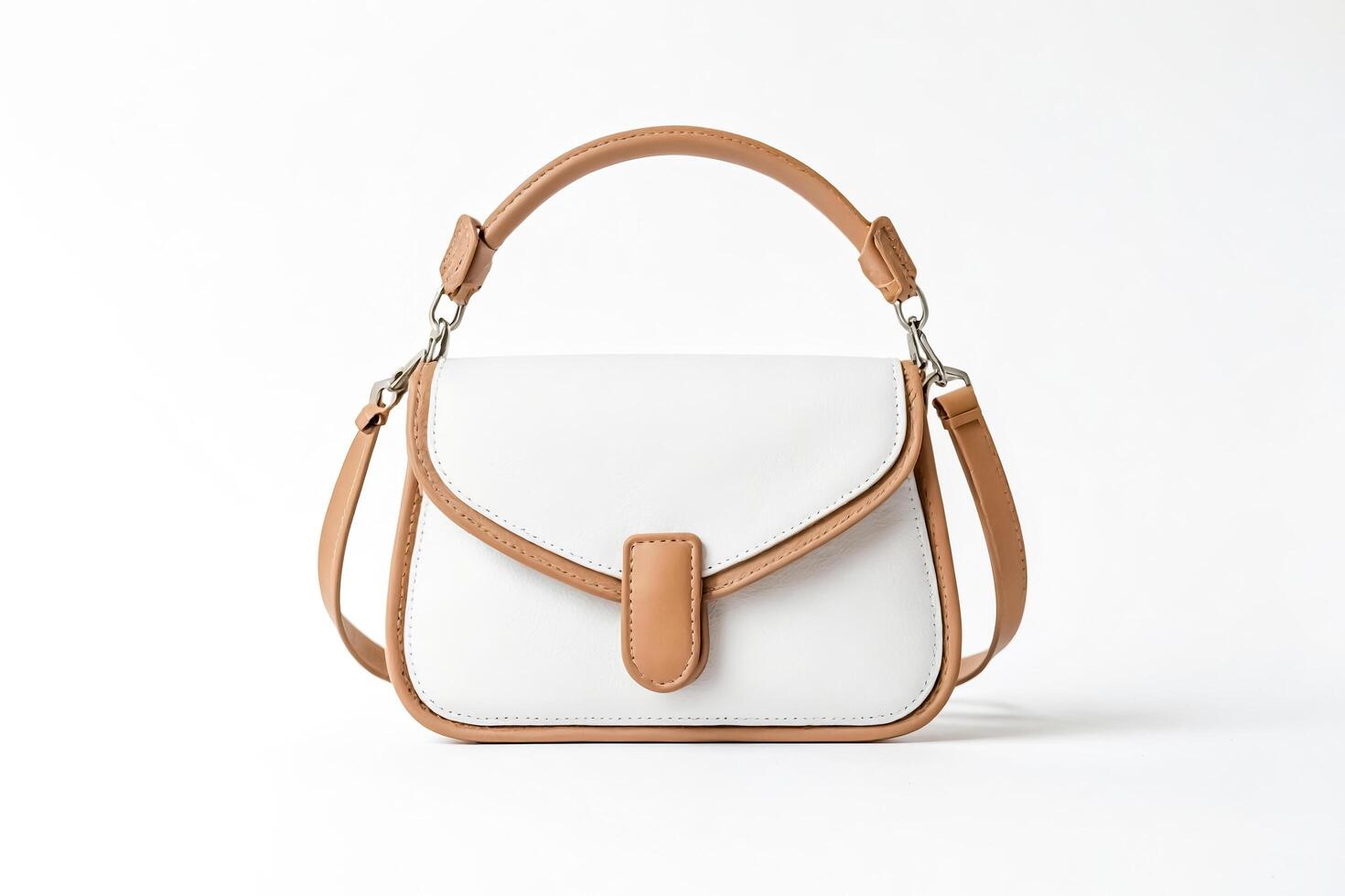 White and Brown Leather Shoulder Bag on White Background photo