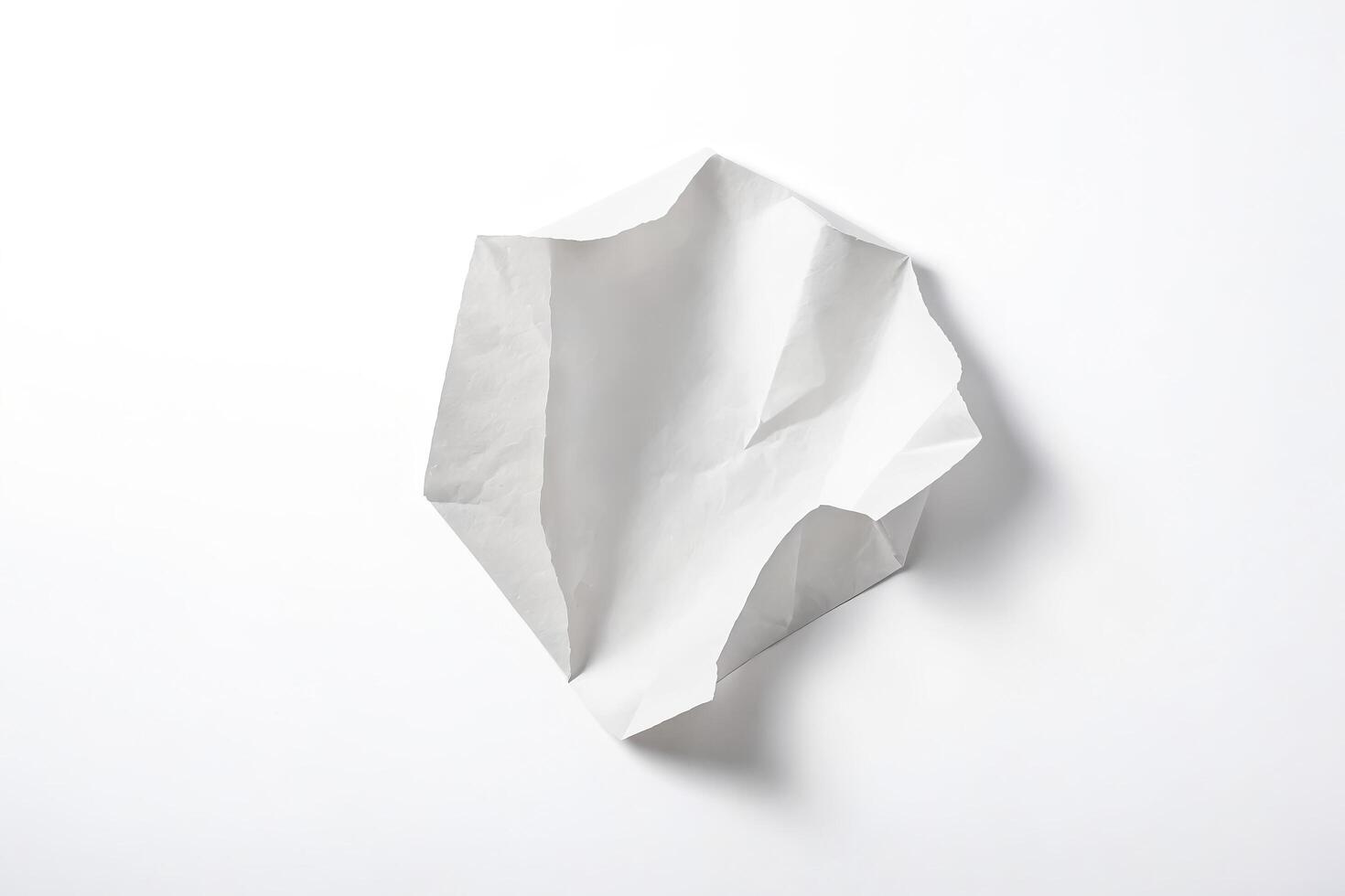 Crumpled White Paper Envelope on White Background photo