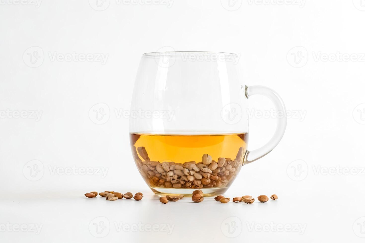 Cup of herbal tea with nuts photo