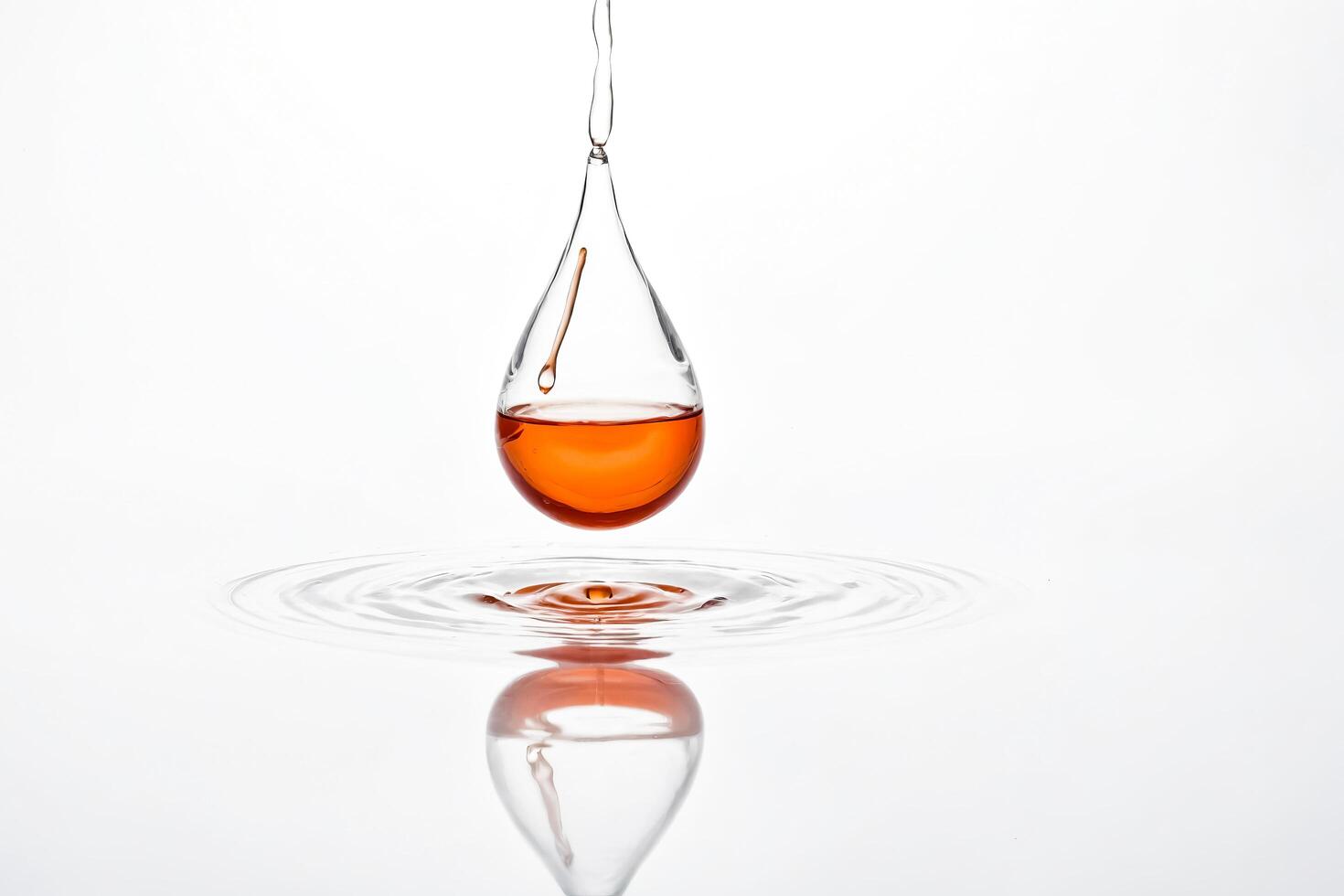 Liquid Droplet in Glass photo