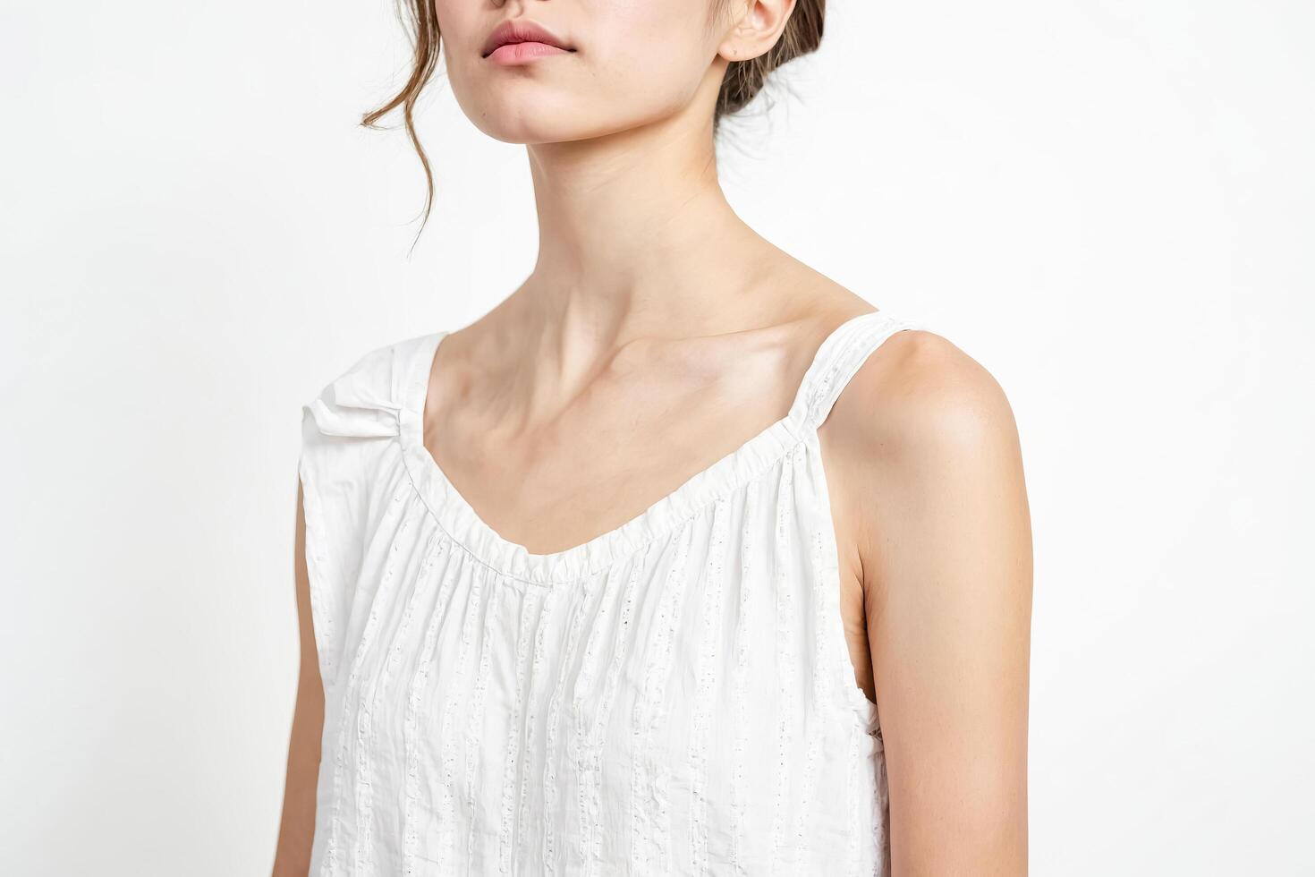 Closeup of a Woman in a White Dress photo