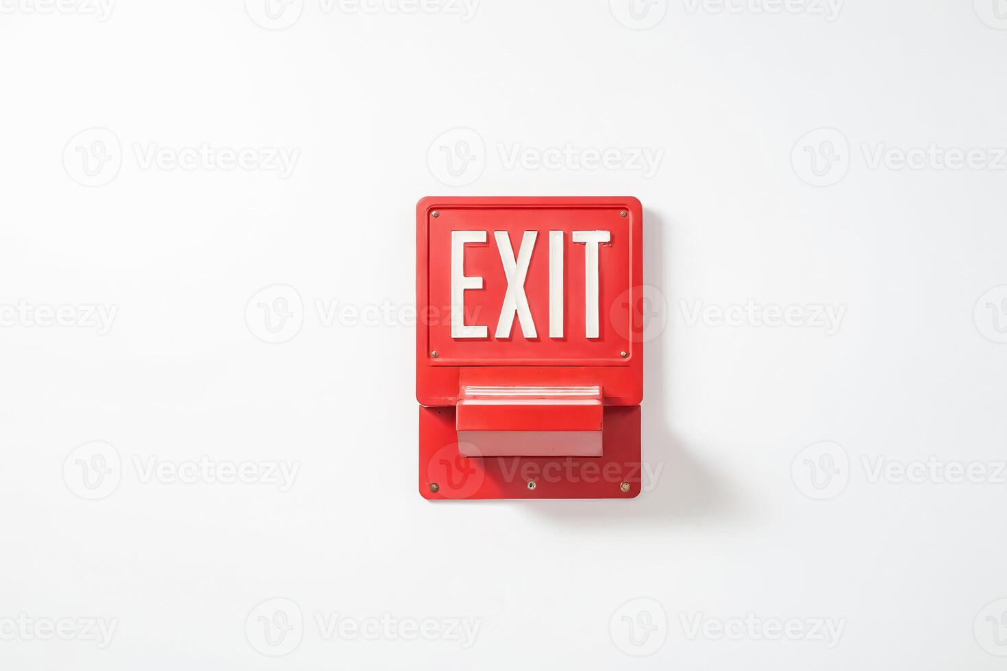 Red Exit Sign on White Wall photo