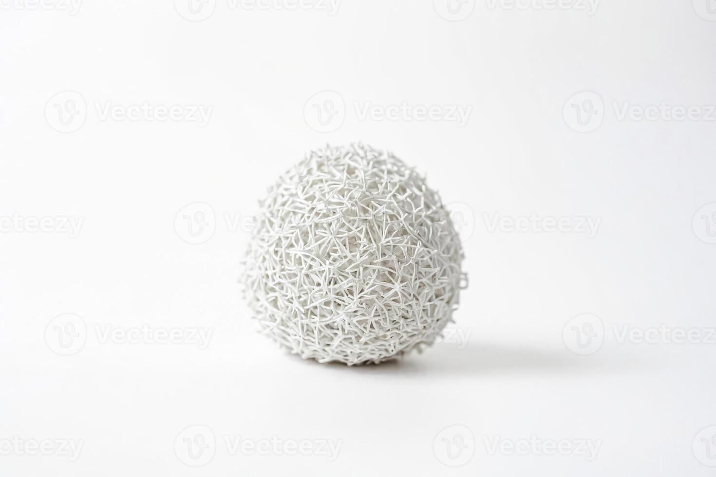 White wicker ball on white background photo