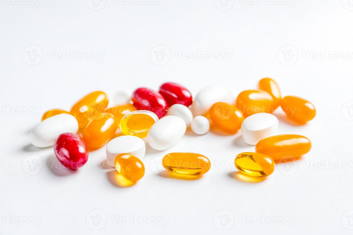 Multicolored Capsules on White Background photo