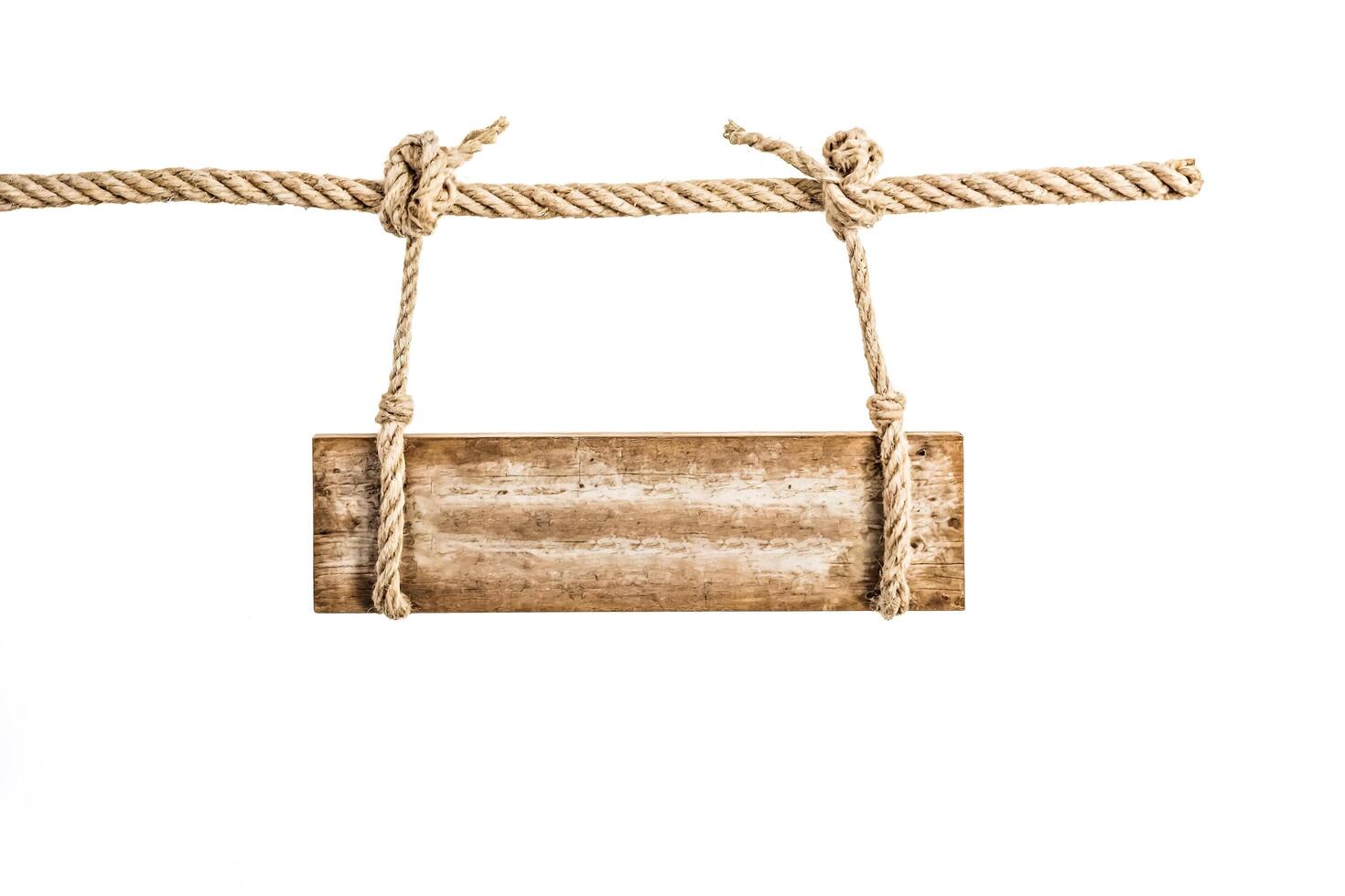 Rustic Wooden Sign Hanging From Rope photo