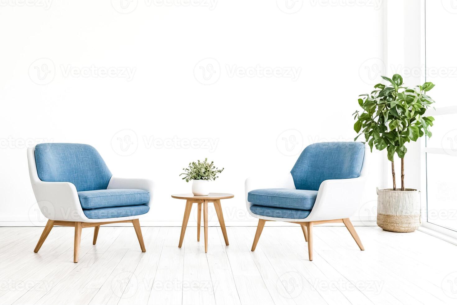 Two Blue Armchairs and a Wooden Table in a Minimalist Room photo