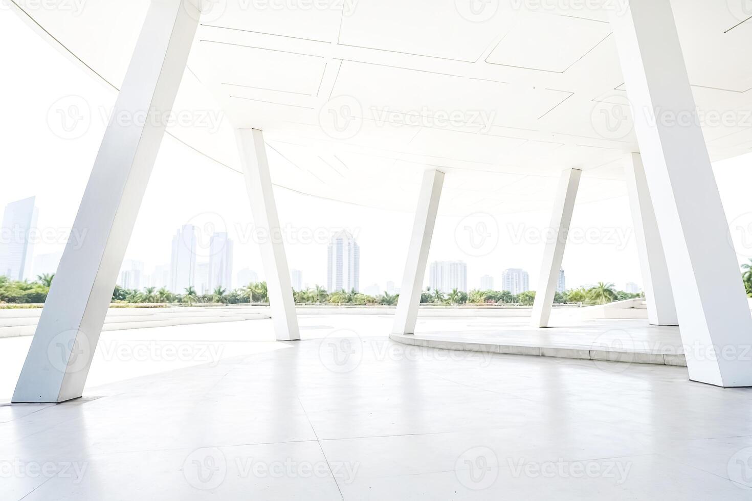 Modern Architecture with White Columns and City Skyline photo