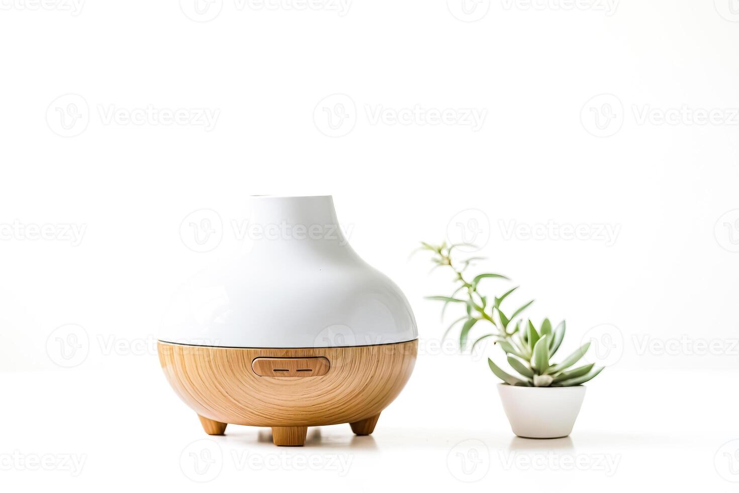 White Essential Oil Diffuser with Wooden Base and Small Succulent Plant photo