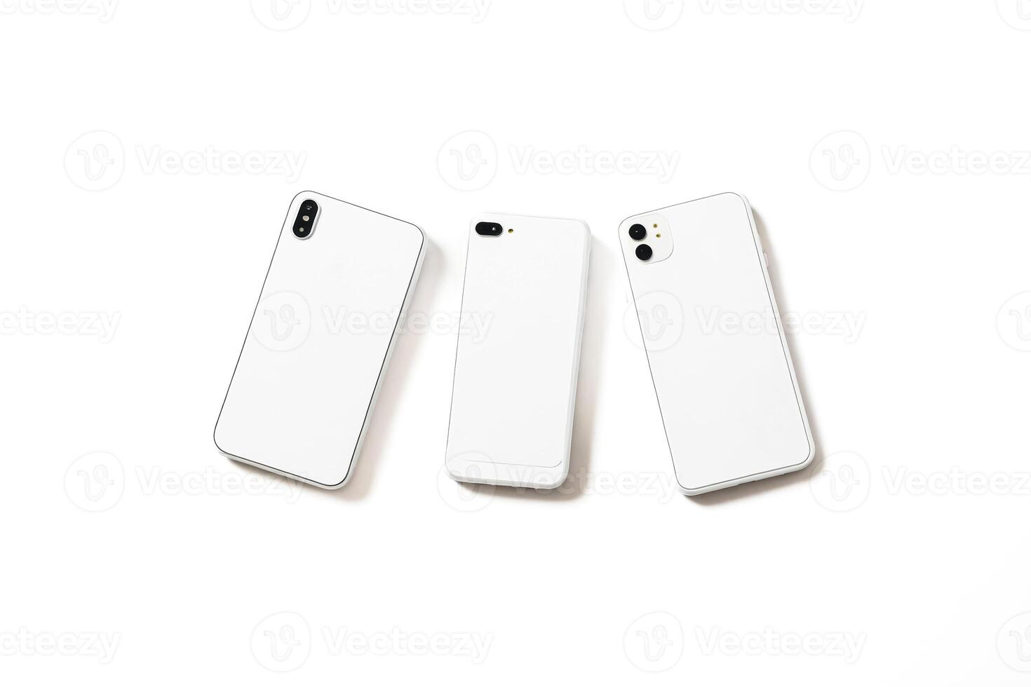 Three White Smartphones On White Background photo