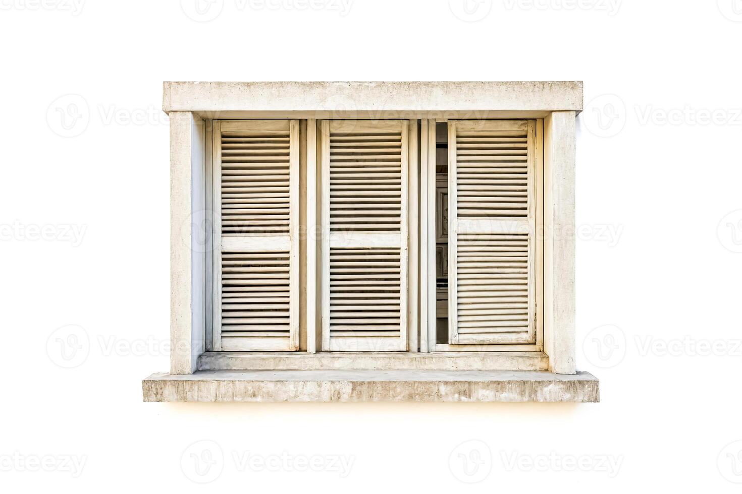 Old window with shutters on a white wall photo