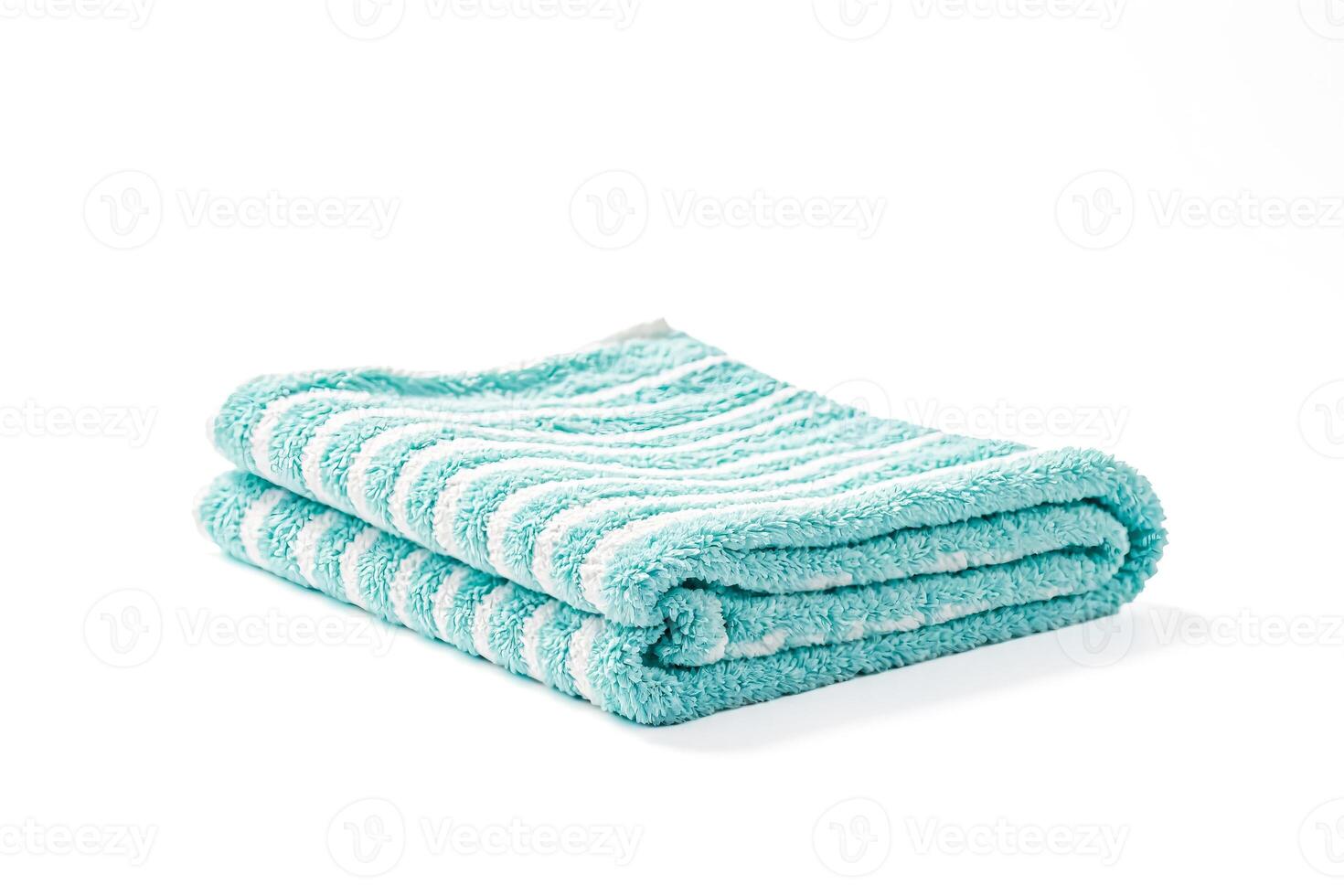 Blue and White Striped Towel Rolled Up photo