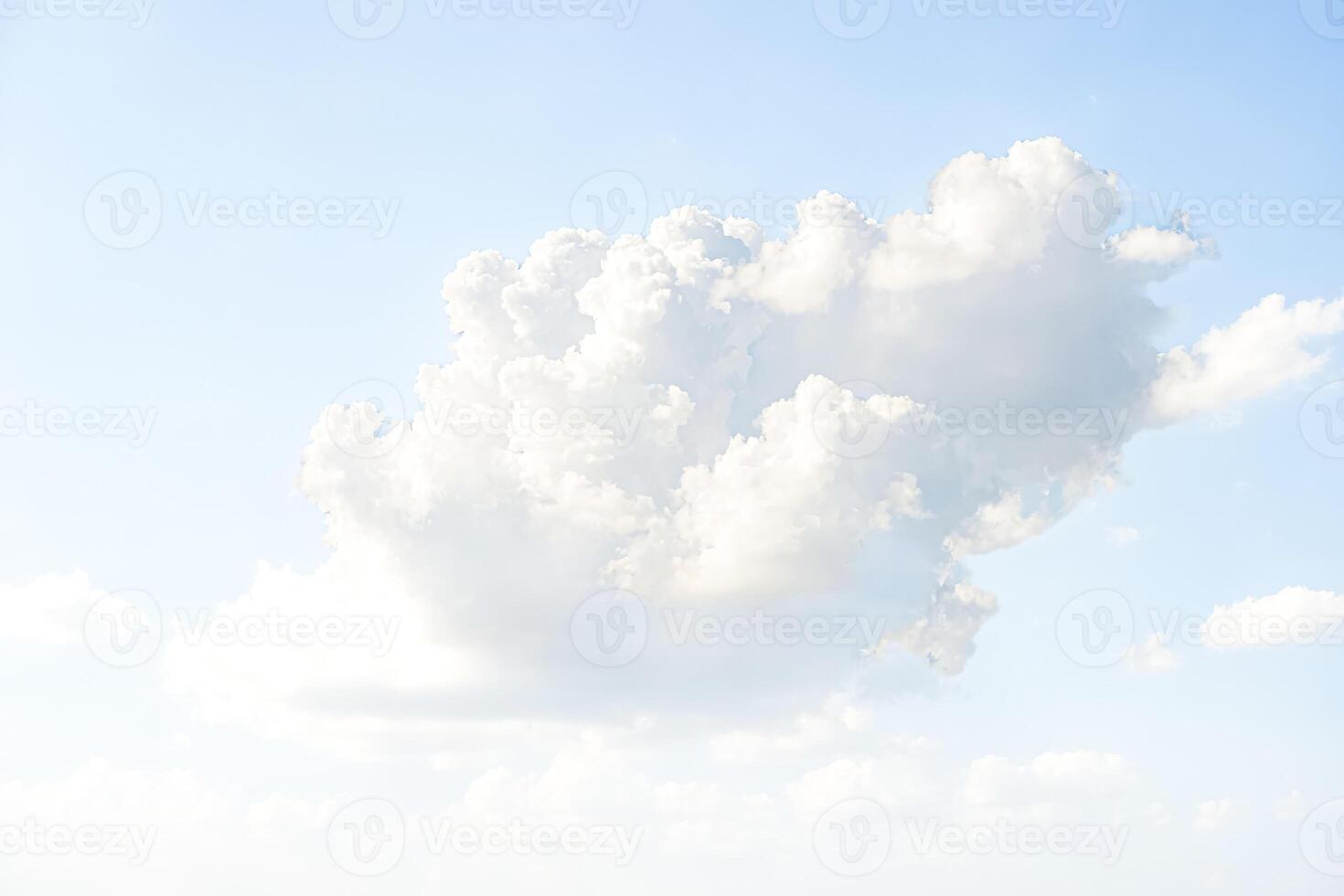 White Cumulus Cloud Formation Against Blue Sky photo