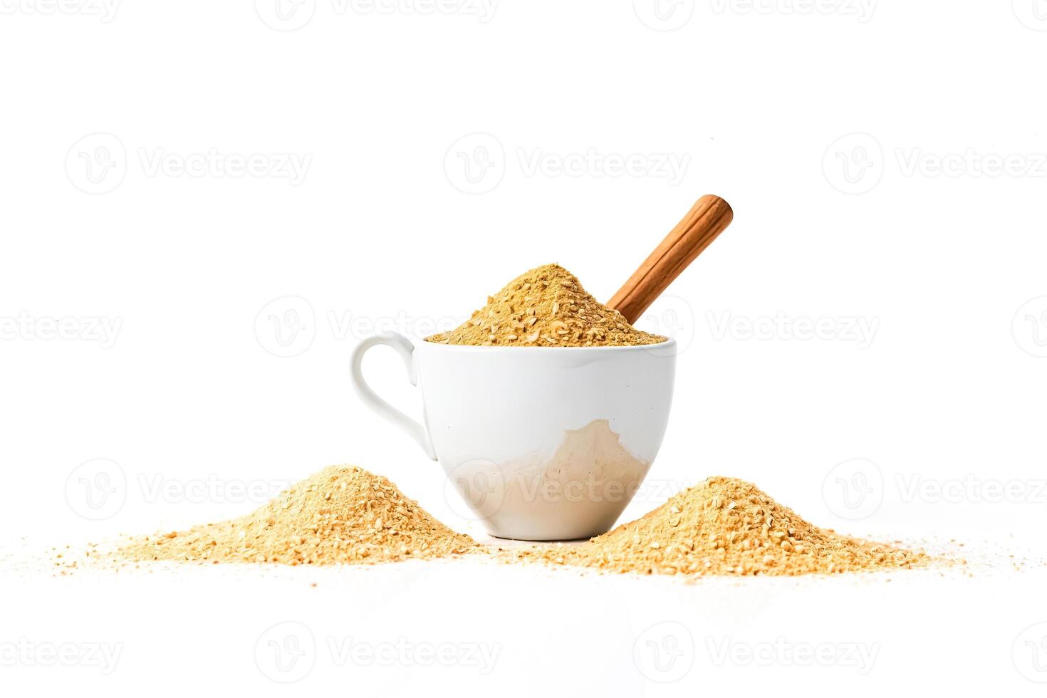 Dried Ginger Powder in White Cup with Wooden Spoon photo