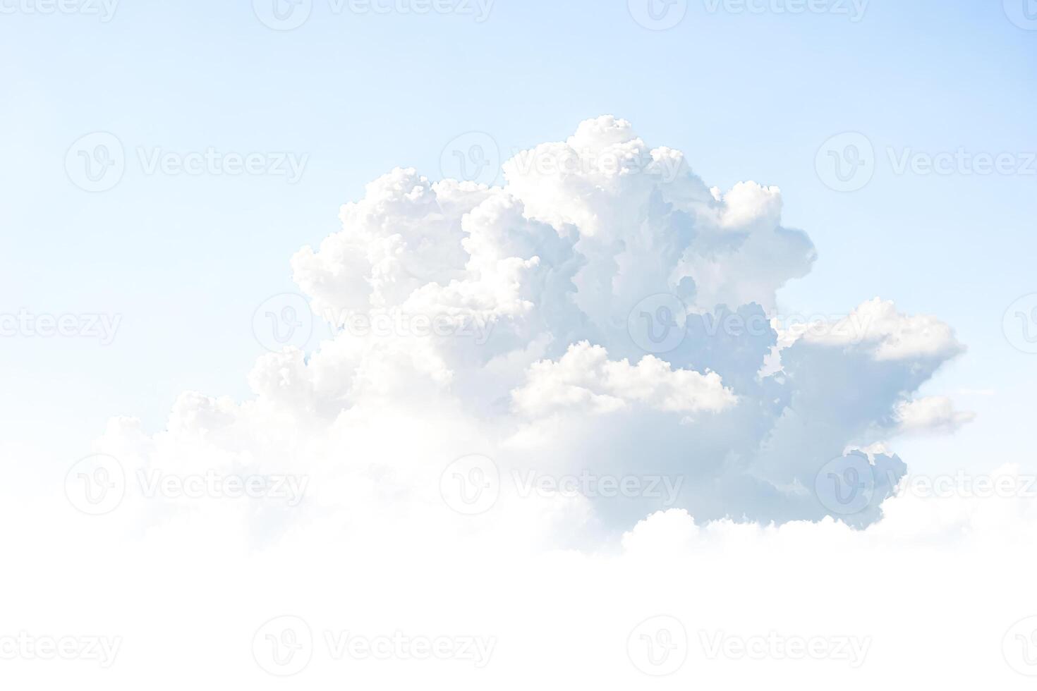 Fluffy White Clouds in Blue Sky photo