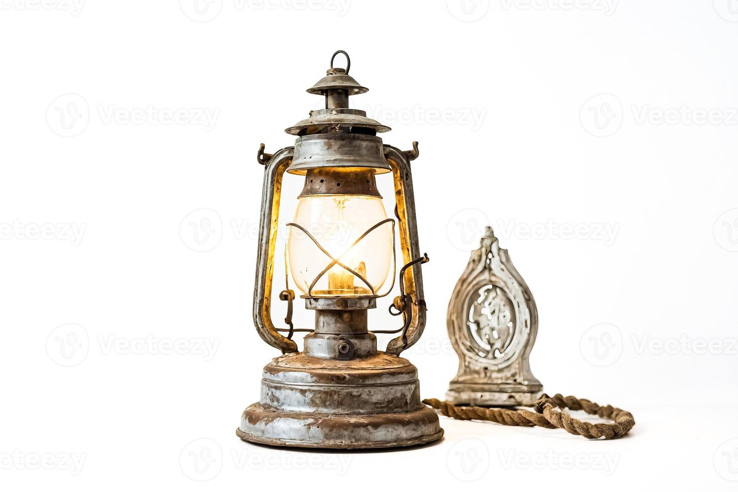 Vintage Lantern with Rope and Decorative Element photo