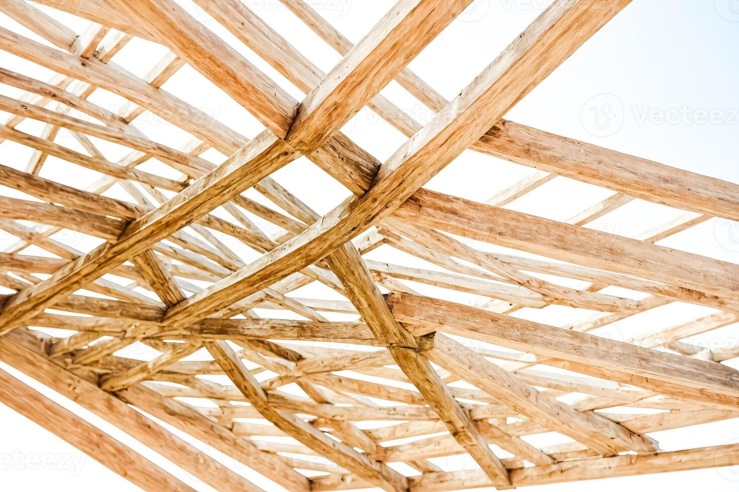 Wooden beams in a roof structure photo