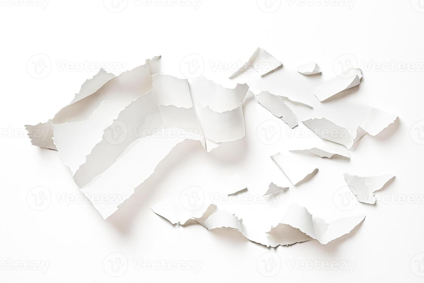 Torn white paper on white background photo