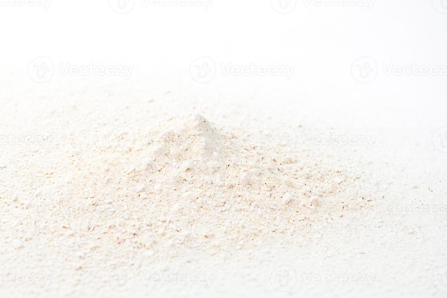 White powder pile on a white background photo