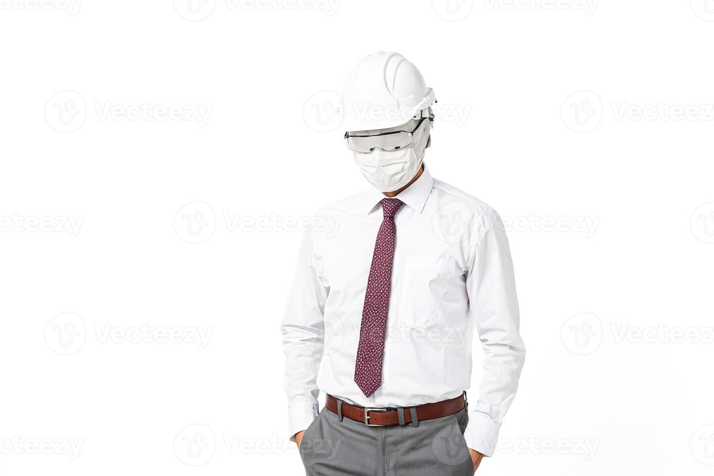 Architect wearing face mask and hardhat photo
