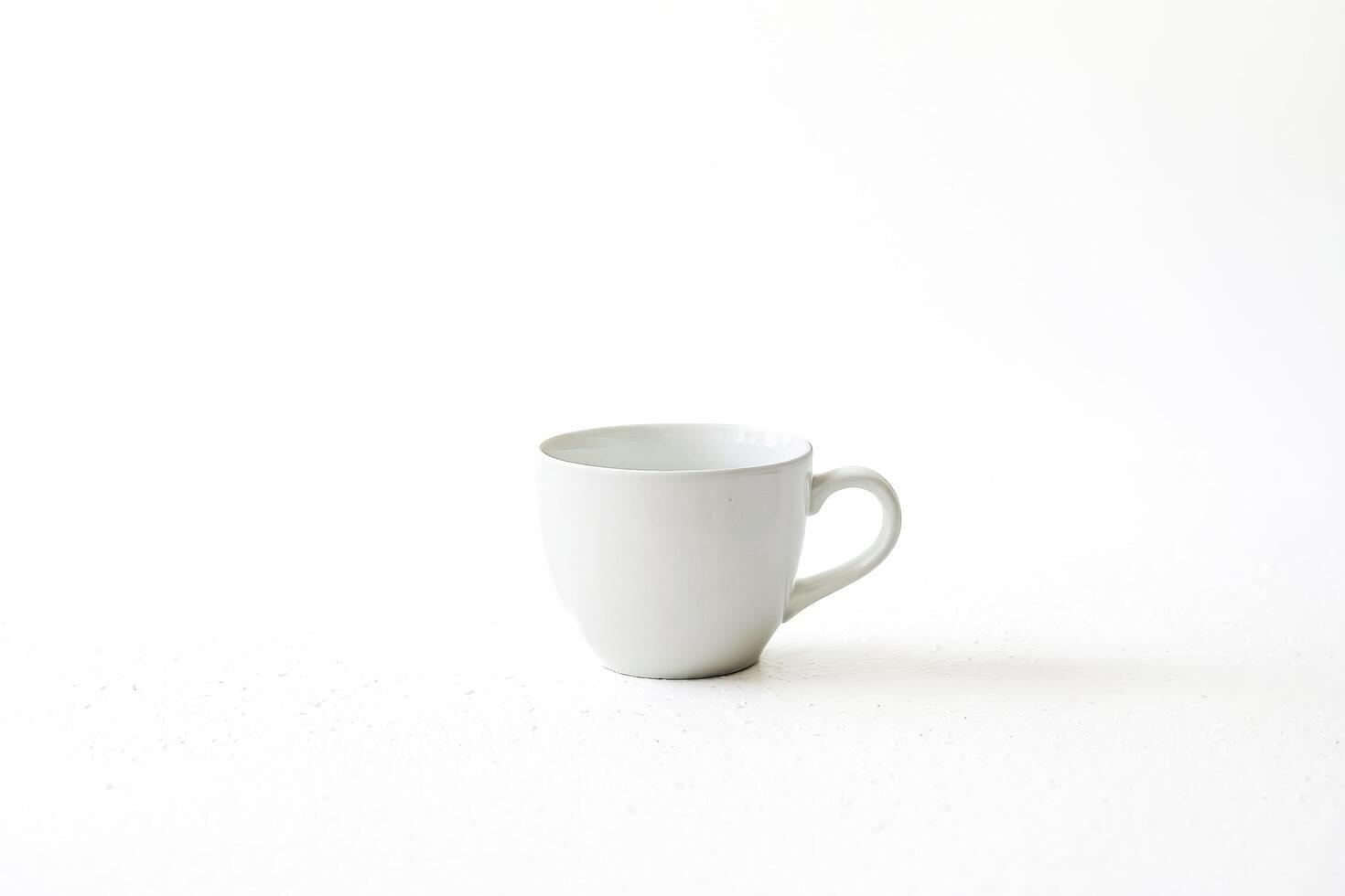 White Ceramic Mug on White Background photo