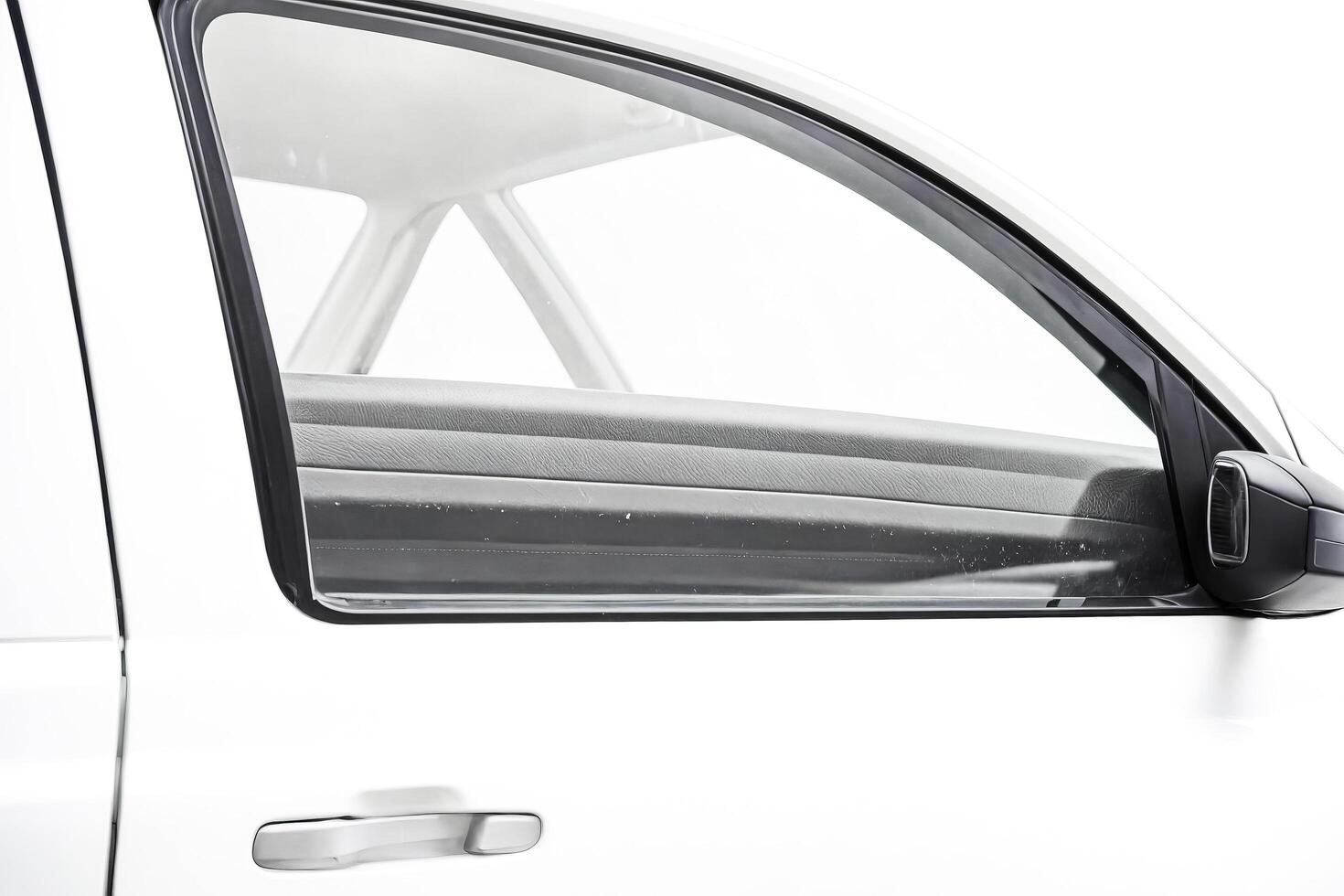 Close-up of a White Car Door with Black Trim photo