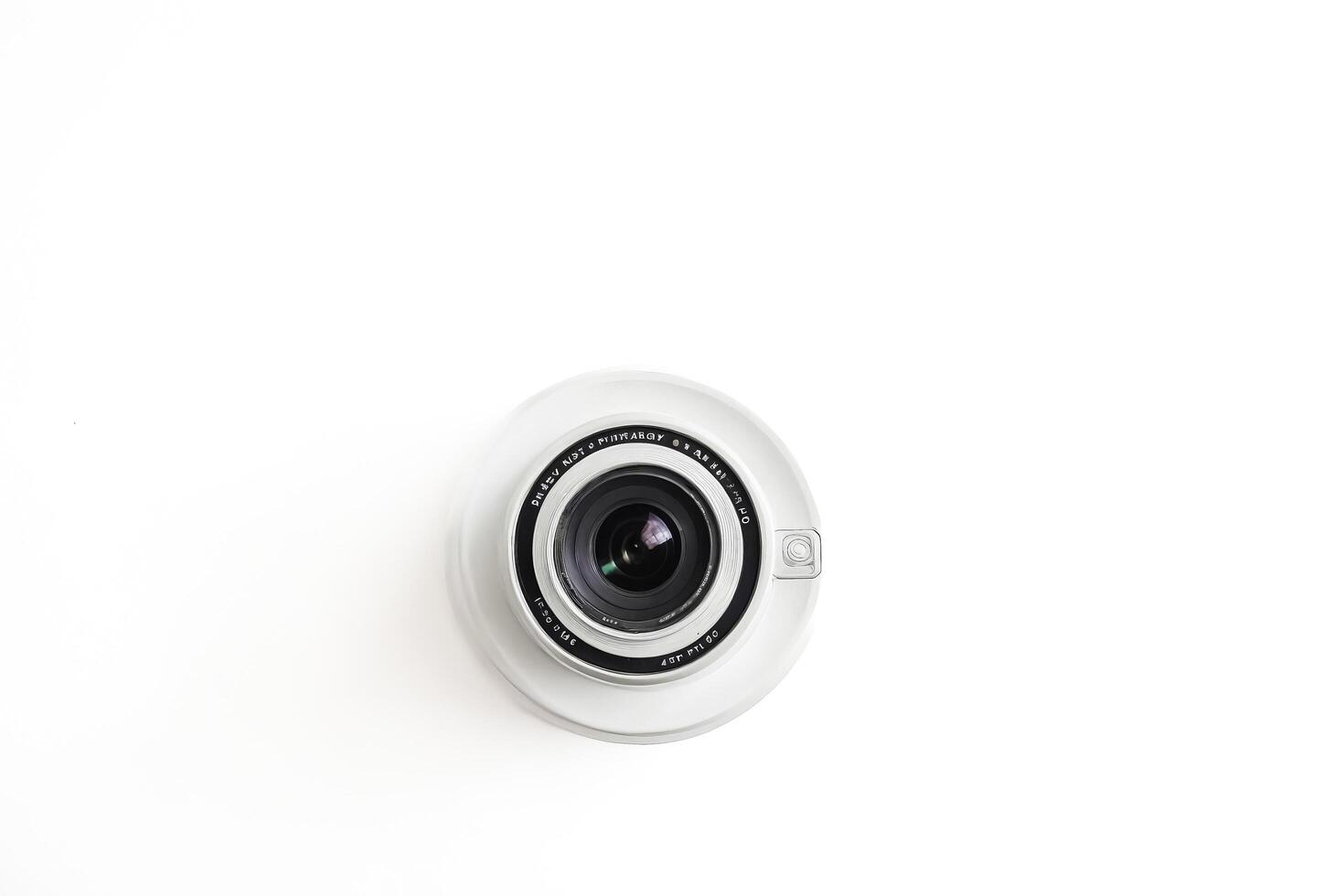 Close-up of a camera lens on a white background photo