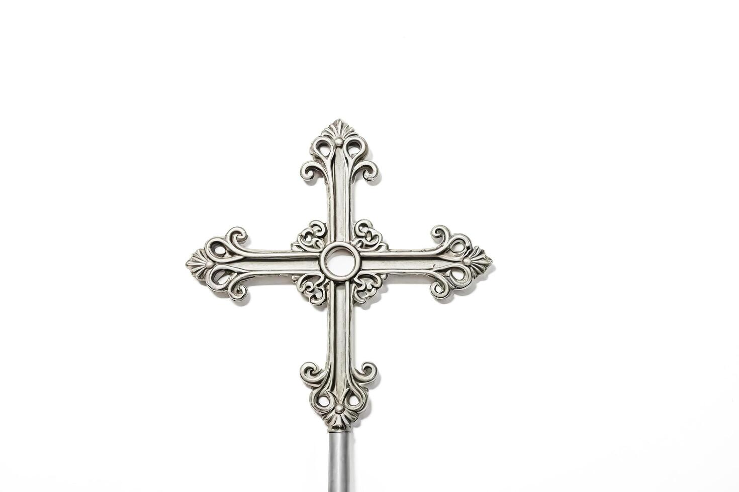 Ornate Silver Cross on White Background photo